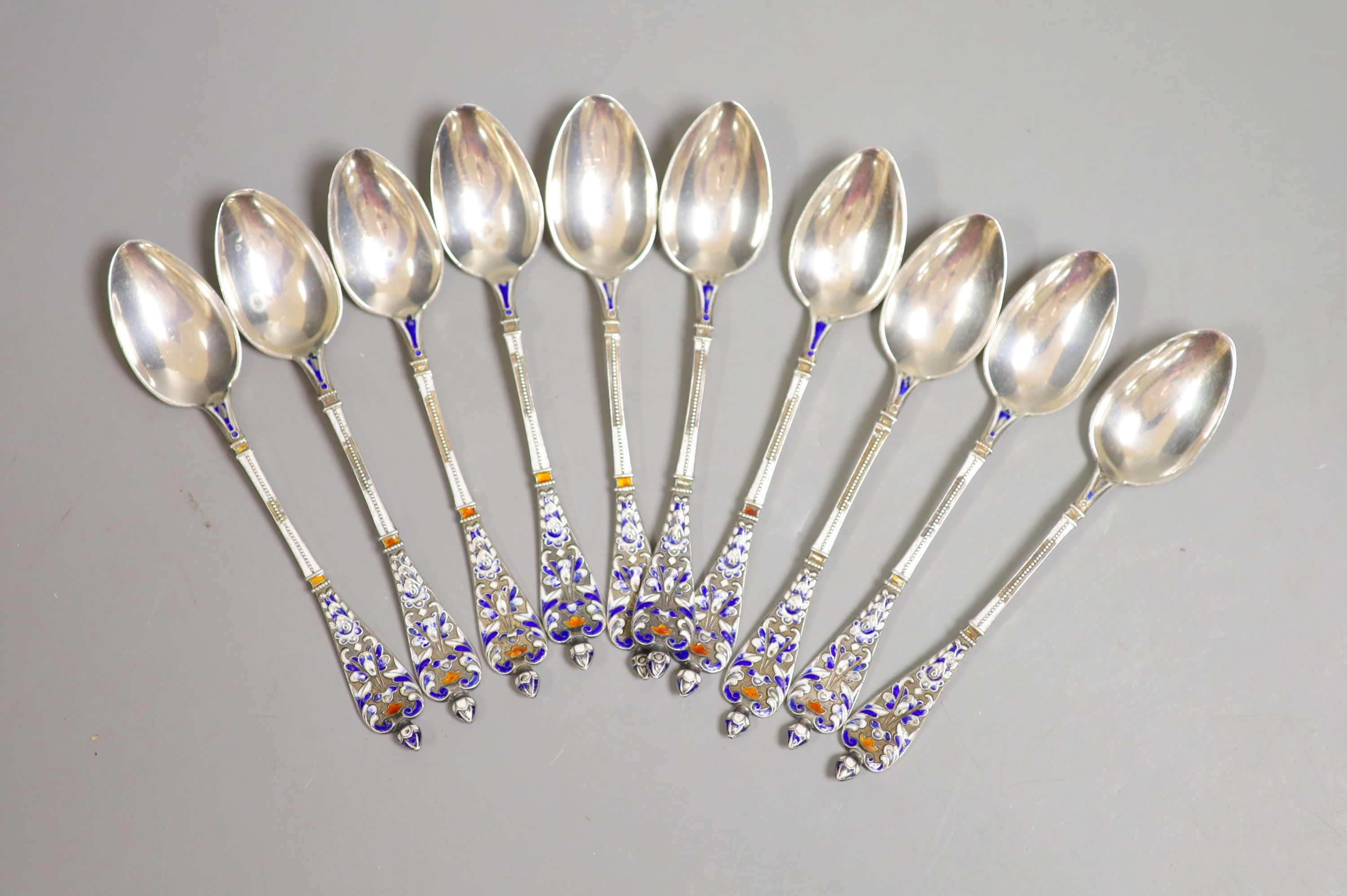 A set of ten continental 800 standard white metal and enamel coffee spoons(a.f.)